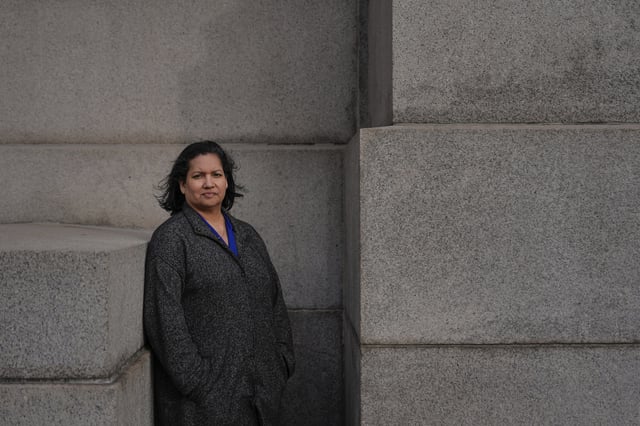 Karen Ortiz, an administrative judge at the Equal Employment Opportunity Commission, poses for photos, Wednesday, Feb. 26, 2025, in New York. (AP Photo/Julia Demaree Nikhinson)