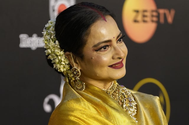 Bollywood actor Rekha poses for a photograph as she arrives for the International Indian Film Academy (IIFA) awards ceremony in Jaipur, India, Sunday, March 9, 2025. (AP Photo/Deepak Sharma)