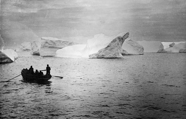 FILE - The Hutchinson family is rowed to safety through the ice floes to the trawler Lord Talbot after their plane was forced down near Eker, Greenland, Sept. 28, 1932. (AP Photo, file)