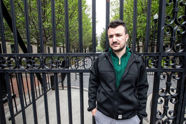Mahmoud Khalil stands outside the gages of the Columbia University Campus in New York on April 30, 2024. Khalil, a graduate student at the university, was notified by the school that he has been suspended.