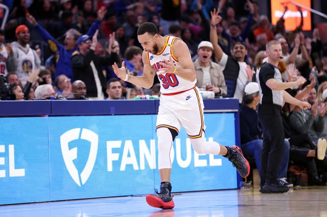 Warriors guard Stephen Curry reacts to his eighth 3-pointer on eight attempts against Philadelphia 76ers on Jan. 2 at Chase Center.