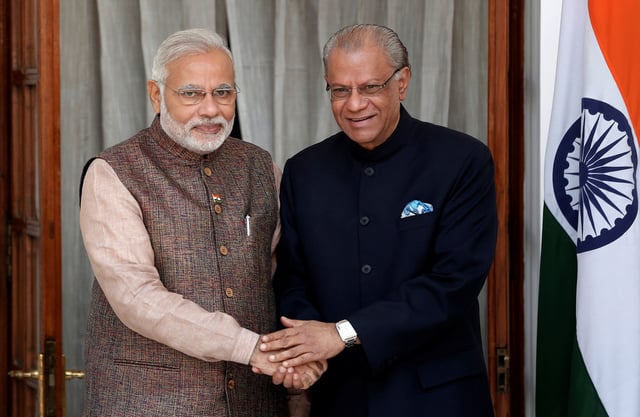 India's Prime Minister Narendra Modi (L) shakes hands with his Mauritian counterpart Navinchandra Ramgoolam before the start of their bilateral meeting in New Delhi May 27, 2014. REUTERS/Adnan Abidi/File Photo