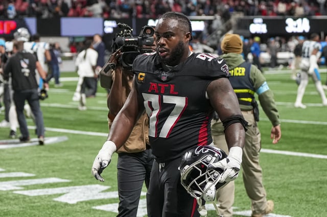 Jan 5, 2025; Atlanta, Georgia, USA; Atlanta Falcons defensive end Grady Jarrett (97) leaves the field after the Falcons were defeated by the Carolina Panthers in overtime at Mercedes-Benz Stadium. Mandatory Credit: Dale Zanine-Imagn Images/File Photo
