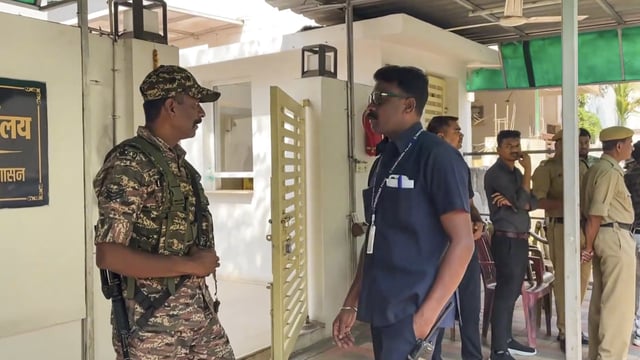Security personnel stand guard during raids by the Enforcement Directorate (ED) on premises linked to Chaitanya Baghel, son of former Chhattisgarh chief minister and Congress leader Bhupesh Baghel.