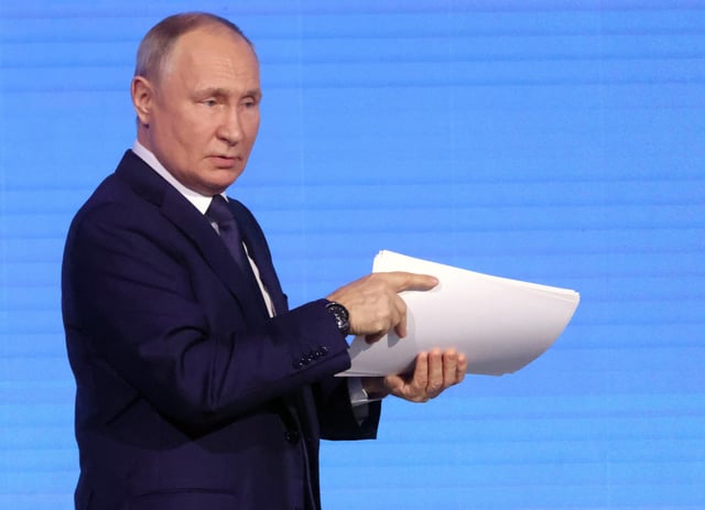 Russian President Vladimir Putin gestures during the Artificial Intelligence Journey 2023 on November 24, 2023, in Moscow, Russia.