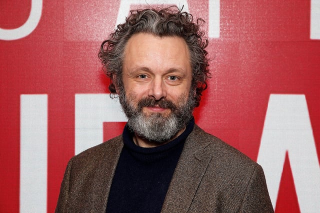 Michael Sheen has spent his own money to write off £1million of his neighbors' debts.