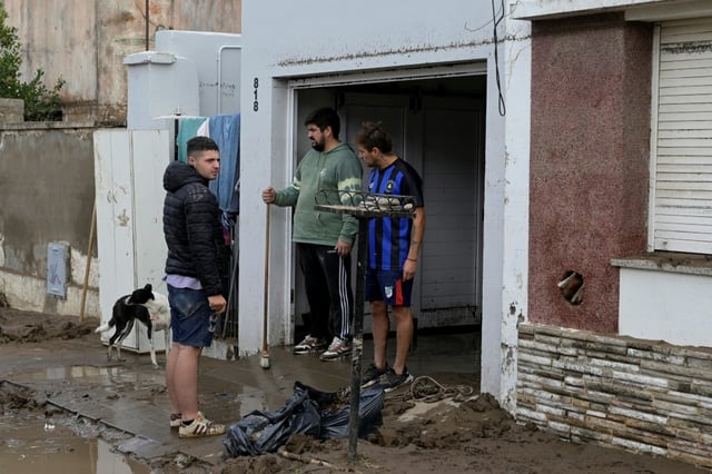 Residents of Bahia Blanca begin cleaning up after the worst flooding in the city in decades
