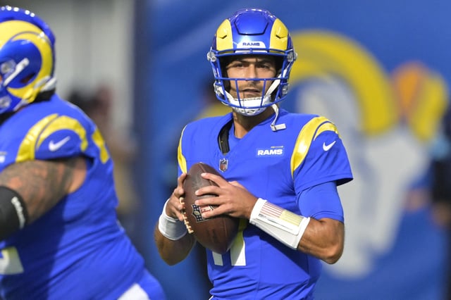 Jan 5, 2025; Inglewood, California, USA; Los Angeles Rams quarterback Jimmy Garoppolo (11) sets to pass in the first half against the Seattle Seahawks at SoFi Stadium. Mandatory Credit: Jayne Kamin-Oncea-Imagn Images/File Photo