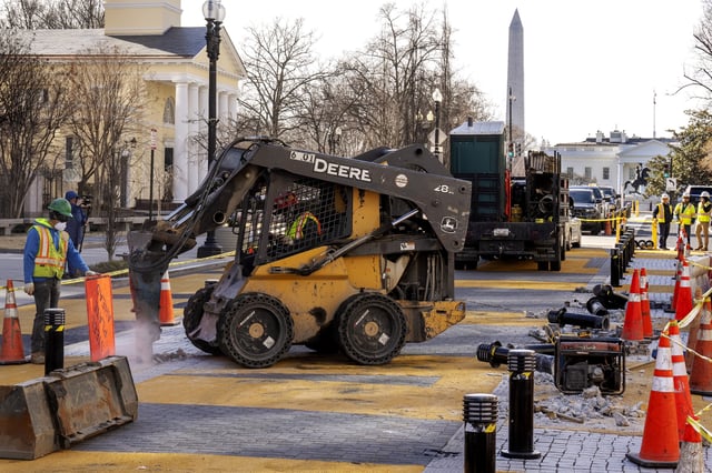 With the White House in the background, demolition begins on the Black Lives Matter mural, Monday, March 10, 2025, in Washington. (AP Photo/Jacquelyn Martin)