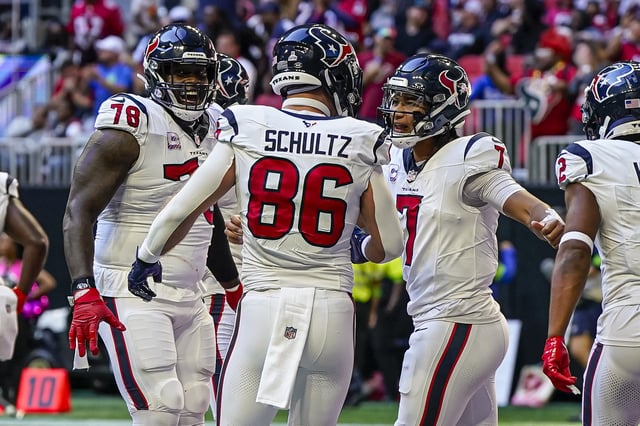 Oct 8, 2023; Atlanta, Georgia, USA; Houston Texans tight end Dalton Schultz (86) reacts with offensive tackle Laremy Tunsil (78) and quarterback C.J. Stroud (7) after catching a touchdown pass against the Atlanta Falcons during the second half at Mercedes-Benz Stadium. Mandatory Credit: Dale Zanine-USA TODAY Sports/File Photo