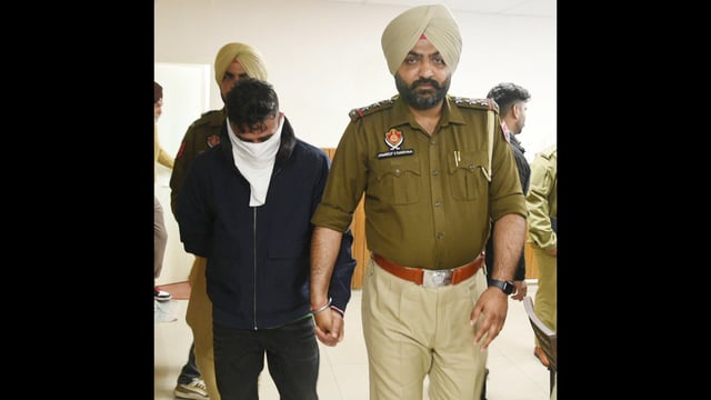 Accused Shehnaz Singh alias Shawn Bhinder, a drug lord wanted by the FBI in police custody. (Sameer Sehgal)