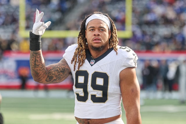 Dec 8, 2024; East Rutherford, New Jersey, USA; New Orleans Saints defensive end Chase Young (99) looks up at fans before the game against the New York Giants at MetLife Stadium. Mandatory Credit: Vincent Carchietta-Imagn Images/File Photo