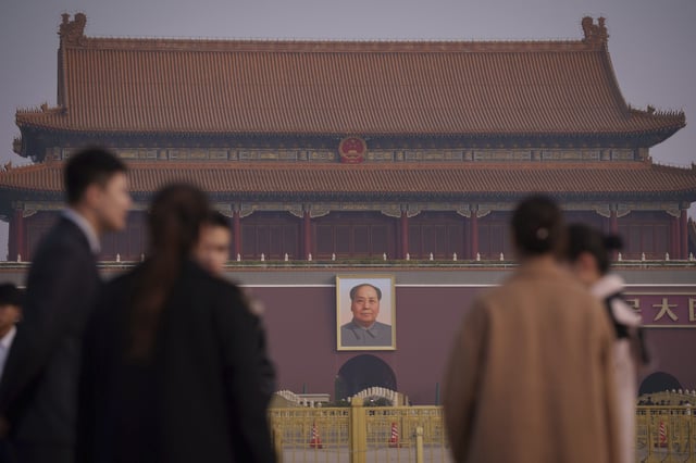 Journalists wait for the arrival of delegates at Tiananmen Square before the closing session of the Chinese People's Political Consultative Conference (CPPCC) in Beijing, China, Monday, March 10, 2025. (AP Photo/Vincent Thian)