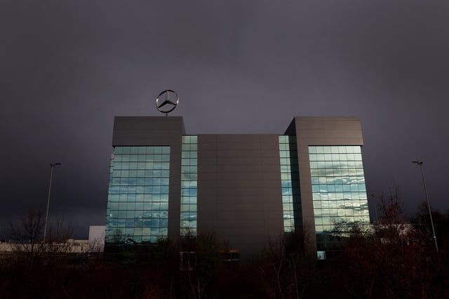The Mercedes-Benz three pointed star logo rotates above the German automotive brand's Vito van factory in Vitoria, Spain, March 9, 2025. REUTERS/Vincent West/File Photo
