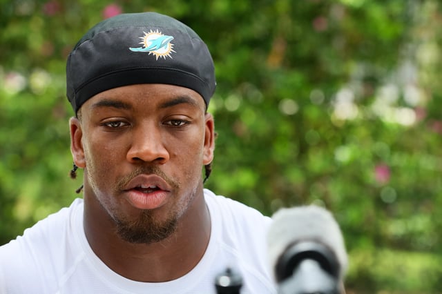 Aug 6, 2024; Miami Gardens, FL, USA; Miami Dolphins safety Jevon Holland (8) talks to reporters after a joint practice with the Atlanta Falcons at Baptist Health Training Complex. Mandatory Credit: Sam Navarro-USA TODAY Sports/File Photo