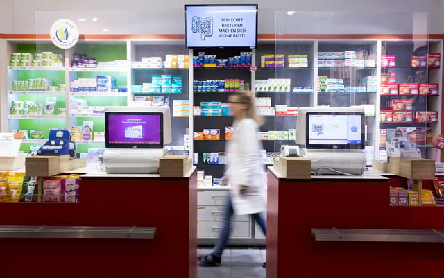 Medicines are displayed on a shelf in a pharmacy in Augsburg, Germany, January 26, 2023. The Augsburg pharmacy produces its own medicines to combat a surge flu cases, especially amongst children. REUTERS/Lukas Barth