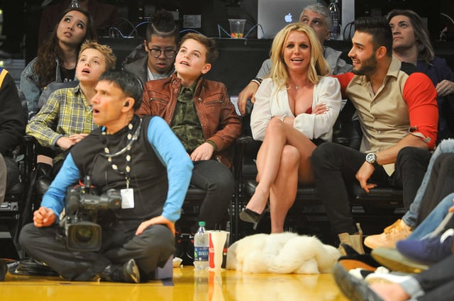 Sean Federline, Jayden James Federline, Britney Spears and Sam Asghari attend a basketball game between the Los Angeles Lakers and the Golden State Warriors at Staples Center on November 29, 2017 in Los Angeles, California.