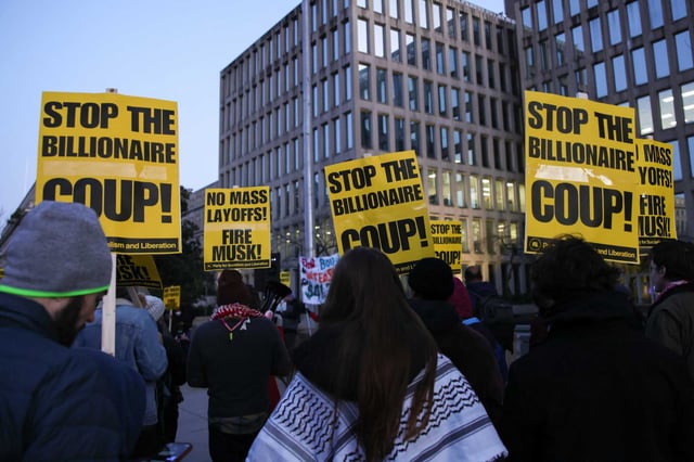 Demonstrators gather outside of the Office of Personnel Management in Washington, D.C., on Feb. 7, 2025, to protest federal layoffs. U.S. District Judge William Alsup of San Francisco, said OPM&#39;s acting director must testify this week on the firings.