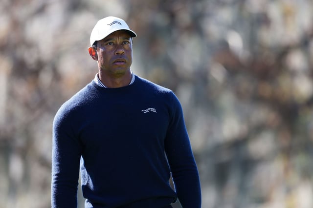 Dec 21, 2024; Orlando, Florida, [USA]; Tiger Woods gets ready to tee off the ninth hole during the PNC Championship at The Ritz-Carlton Golf Club. Mandatory Credit: Nathan Ray Seebeck-Imagn Images