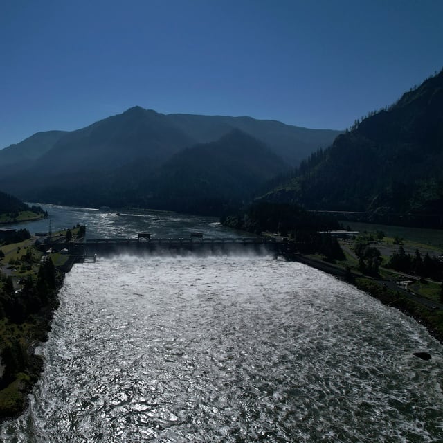 Water spills over the Bonneville Dam on the Columbia River, which runs along the Washington and Oregon state line, June 21, 2022. British Columbia's Energy Ministry says the United States has paused negotiations with Canada on the wide-reaching Columbia River Treaty. THE CANADIAN PRESS/AP-Jessie Wardarski