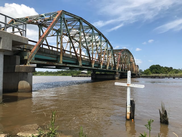 The East Pearl River runs high at the border of Mississippi and Slidell, Louisiana, on May 27, 2019. Elliot's body was found along the river on Thanksgiving Day in 1996.