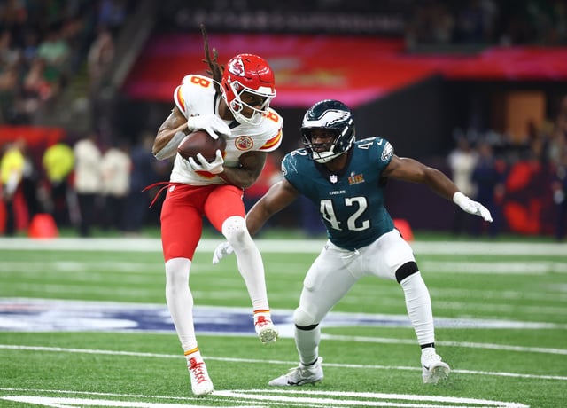 Feb 9, 2025; New Orleans, LA, USA;  Kansas City Chiefs wide receiver DeAndre Hopkins (8) catches a pass against Philadelphia Eagles linebacker Oren Burks (42) in the third quarter in Super Bowl LIX at Ceasars Superdome. Mandatory Credit: Mark J. Rebilas-Imagn Images/File Photo