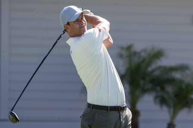 January 2, 2025; Maui, Hawaii, USA; Adam Scott hits his tee shot on the first hole during the first round of The Sentry golf tournament at Plantation Course at Kapalua. Mandatory Credit: Kyle Terada-Imagn Images/File Photo