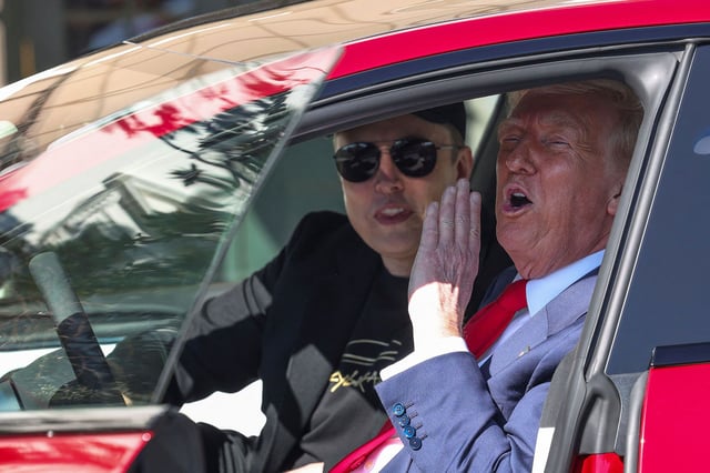U.S. President Donald Trump and Tesla CEO Elon Musk sit in a Tesla car model S, in front of the White House in Washington, D.C., U.S., March 11, 2025. REUTERS/Kevin Lamarque
