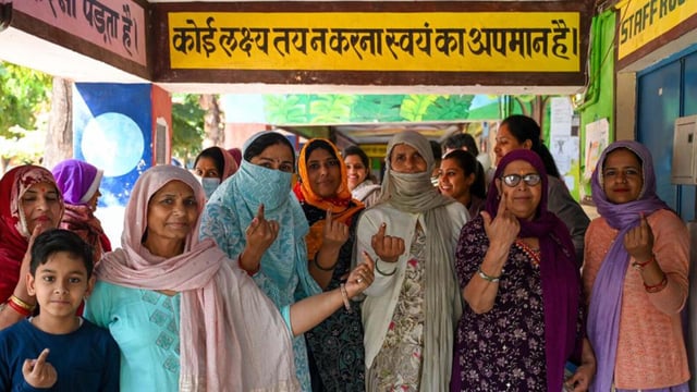 Women voters show their inked finger after casting their ballot for during the civic body elections in Gurugram on March 2. (Parveen Kumar/ HT Photo)
