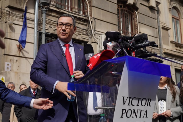 Victor Ponta, former Romanian prime minister, talks to media after submitting his candidacy for presidential elections, in Bucharest, Romania, March 12, 2025. REUTERS/Andreea Campeanu