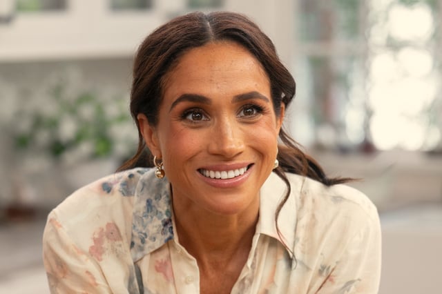 Meghan Markle smiles during filming for her Netflix cooking show &#39;With Love, Meghan&#39; which made the global top ten.