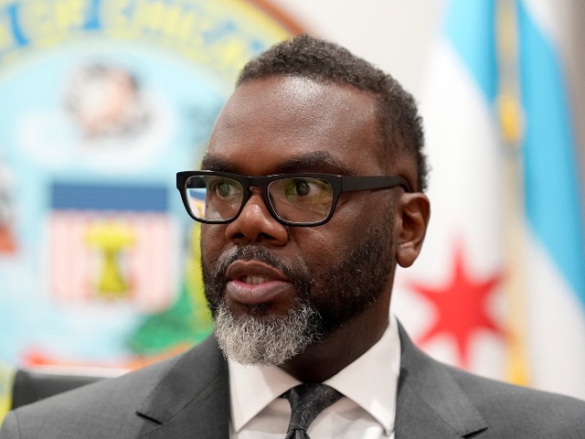 Chicago Mayor Brandon Johnson responds to a question in his City Hall office during an interview with The Associated Press Monday, May 6, 2024, in Chicago. The rookie mayor's bumpy first year has been a test of his progressive credentials. He's navigated an evolving migrant crisis, budget gaps, persistent crime and a troubled transit system to name a few. While there have been wins for workers and social services, he's struggled with businesses, police and fellow Democrats. (Charles Rex Arbogast/AP)