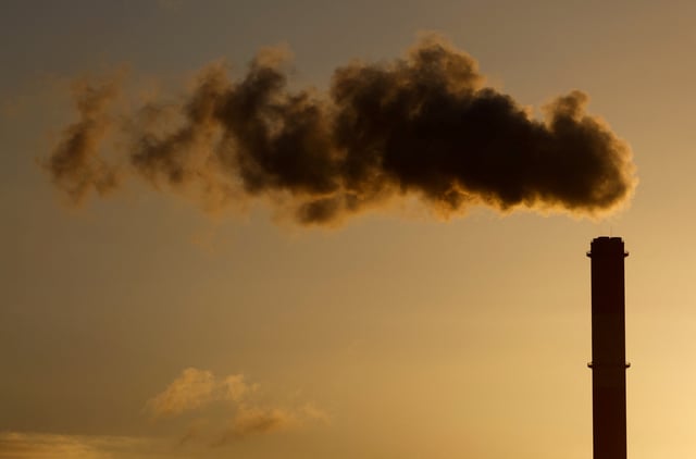 A view shows emissions from the smoke stack of the Electricite de France (EDF) coal-fired power plant in Cordemais near Nantes, France, January 20, 2022. REUTERS/Stephane Mahe/File Photo
