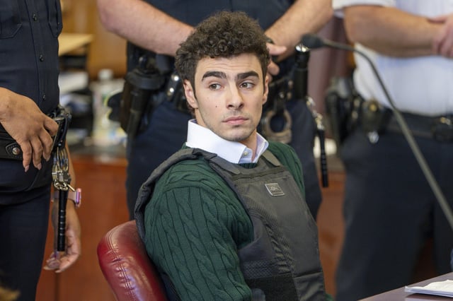 Luigi Mangione, accused of fatally shooting the UnitedHealthcare CEO Brian Thompson in New York City and leading authorities on a five-day search, appears in court for a hearing, Friday, Feb. 21, 2025, in New York.