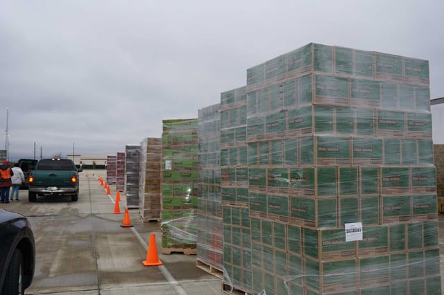 Nearly 266,000 boxes of cookies were scheduled for distribution at a Girl Scout Cookie Drop at Legacy Stadium in Katy.