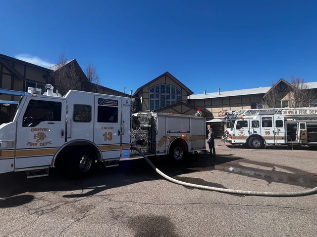 Fire trucks stationed outside the assisted-living facility involved in the fire on Wednesday.