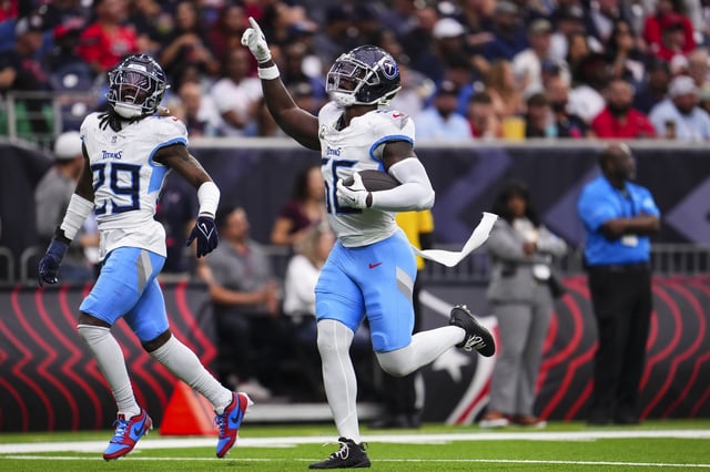 HOUSTON, TX - NOVEMBER 24: Kenneth Murray Jr. #56 of the Tennessee Titans celebrates during an NFL football game against the Houston Texans at NRG Stadium on November 24, 2024 in Houston, Texas.