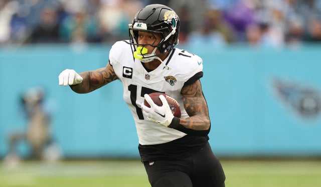 Evan Engram #17 of the Jacksonville Jaguars against the Tennessee Titans at Nissan Stadium on December 08, 2024 in Nashville, Tennessee.