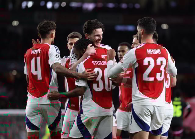 Soccer Football - Champions League - Round of 16 - Second Leg - Arsenal v PSV Eindhoven - Emirates Stadium, London, Britain - March 12, 2025 Arsenal's Declan Rice celebrates scoring their second goal with teammates REUTERS/David Klein