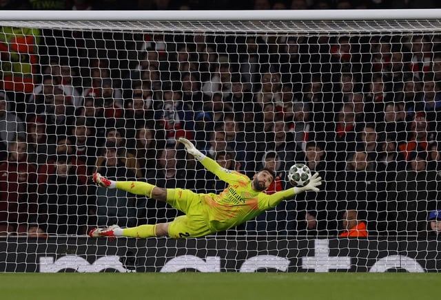 Soccer Football - Champions League - Round of 16 - Second Leg - Arsenal v PSV Eindhoven - Emirates Stadium, London, Britain - March 12, 2025 Arsenal's David Raya makes a save Action Images via Reuters/Andrew Couldridge