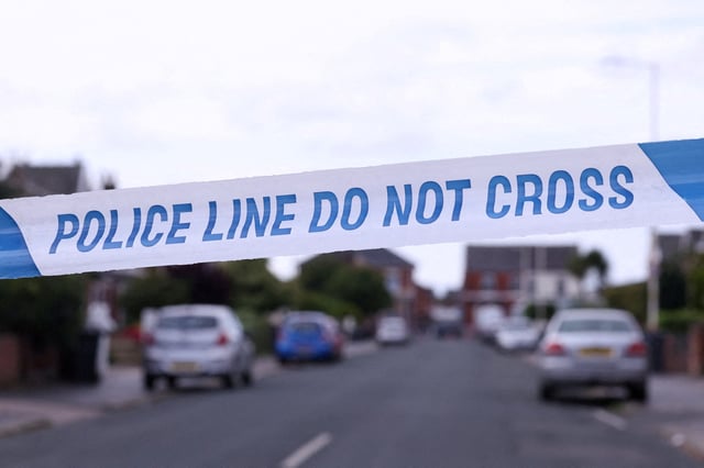 Police tape outlines a perimeter, in Maple street, near a tribute for the victims of a knife attack in Southport, Britain, August 2, 2024. REUTERS/Manon Cruz/File Photo