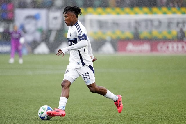 Feb 23, 2025; Portland, Oregon, USA; Vancouver Whitecaps FC midfielder Edier Ocampo (18) controls the ball during the second half against the Portland Timbers  at Providence Park. Mandatory Credit: Soobum Im-Imagn Images/File Photo