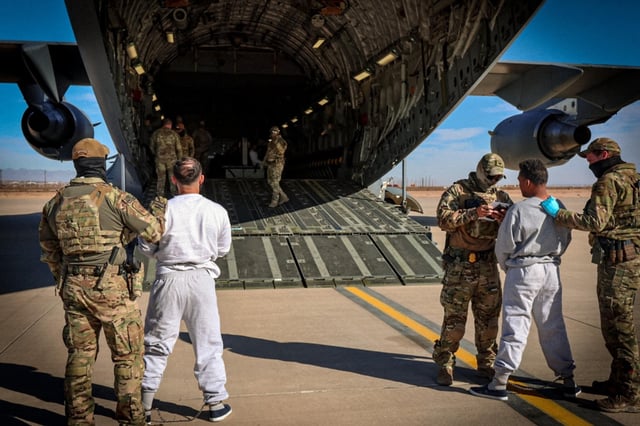 The Department of Homeland Security released images of the first flight carrying undocumented migrants to Guantanamo Bay.
