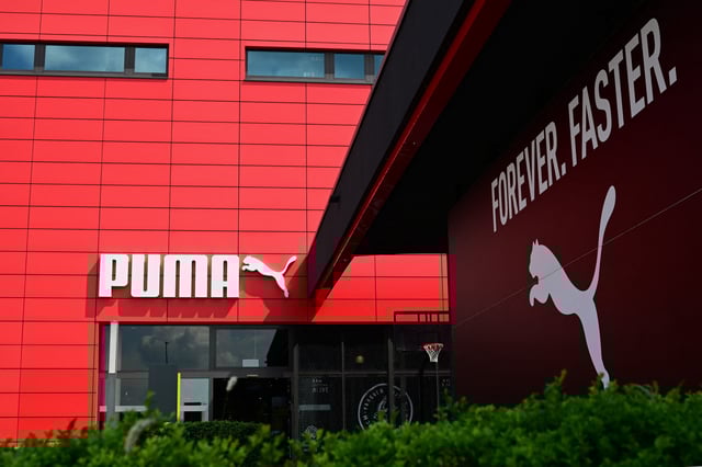 A photo taken on June 27, 2024 shows the PUMA logo on the facade of the outlet of German multinational sportswear manufacturer Puma in Herzogenaurach, southern Germany.