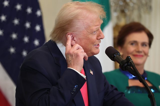 U.S President Donald Trump meets with Irish Taoiseach Micheál Martin and his wife Mary O&#39;Shea during a St. Patrick’s Day event in the East Room of the White House on March 12 in Washington, DC.