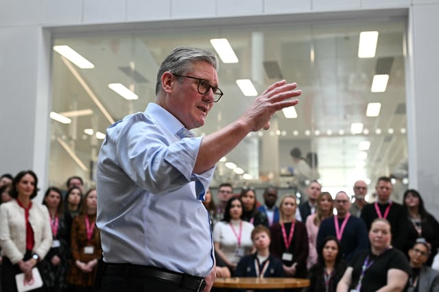Britain's Prime Minister Keir Starmer gestures during a Q&A session after delivering a speech on plans to reform the civil service, during a visit to Reckitt Benckiser Health Care UK Ltd in Kingston upon Hull, Britain, March 13, 2025.  OLI SCARFF/Pool via REUTERS