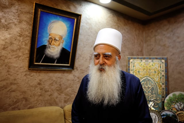 Leader of the Druze community in Israel Sheikh Mowafaq Tarif speaks with Reuters at his house in Julis, northern Israel March 13, 2025 REUTERS/Ammar Awad
