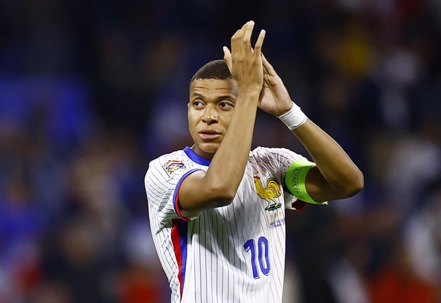 Soccer Football - Nations League - League A - Group 2 - France v Belgium - Groupama Stadium, Lyon, France - September 9, 2024 France's Kylian Mbappe applauds fans after the match REUTERS/Sarah Meyssonnier/File Photo