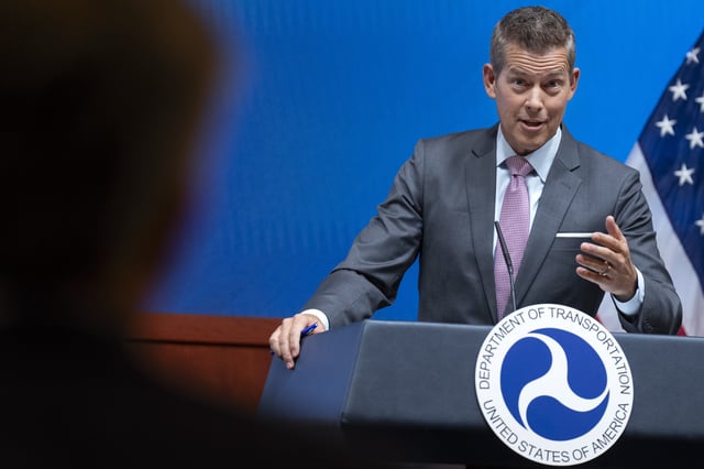 Transportation Secretary Sean Duffy speaks during a news conference following up on the issuance of the National Transportation Safety Board (NTSB) preliminary report on the mid-air collision near Ronald Reagan Washington National Airport, Tuesday, March 11, 2025, at the Department of Transportation in Washington. (AP Photo/Jacquelyn Martin)