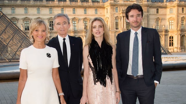 Bernard Arnault at the Louvre with his wife, Hélène Mercier, and his son, Antoine, who married the Russian model Natalia Vodianova in 2020